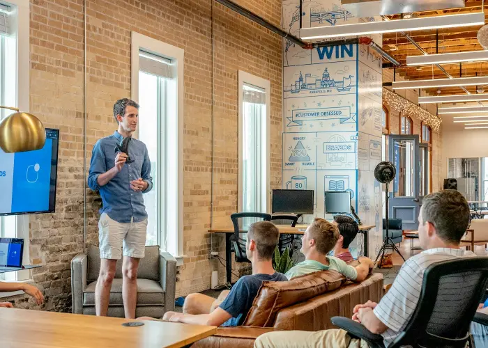Mayden Group adviser meeting with a small-business owner